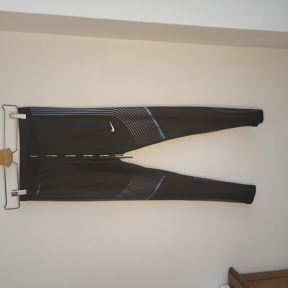 Nike black and blue leggings in Small.